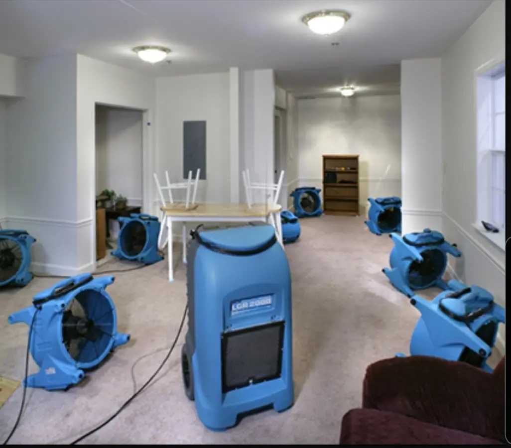 Air movers and dehumidifier setup for Water Damage Restoration in West Falls Church